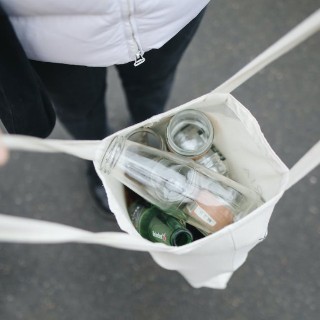 Open bag with recyclable objects 